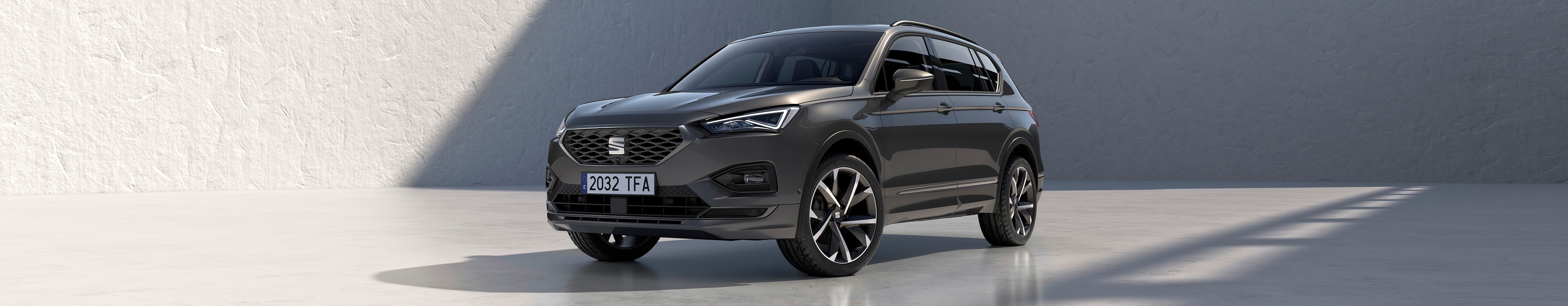 New SEAT Tarraco SUV 7 seater parked outside building beauty shot