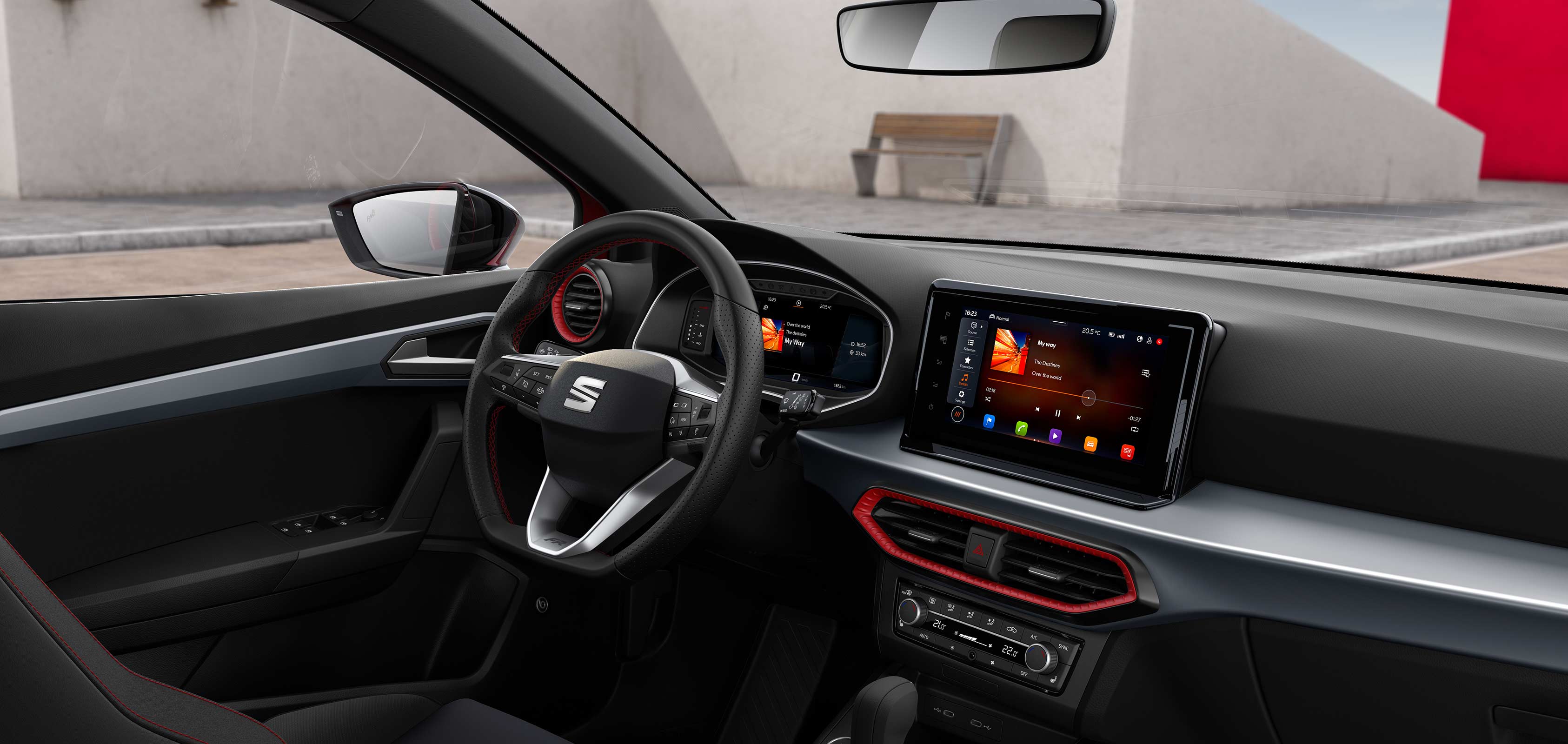SEAT Ibiza Innenansicht mit Lenkrad und Infotainment-Bildschirm